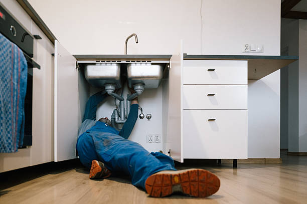 Professional Drain Cleaning technician working in Miller, MO